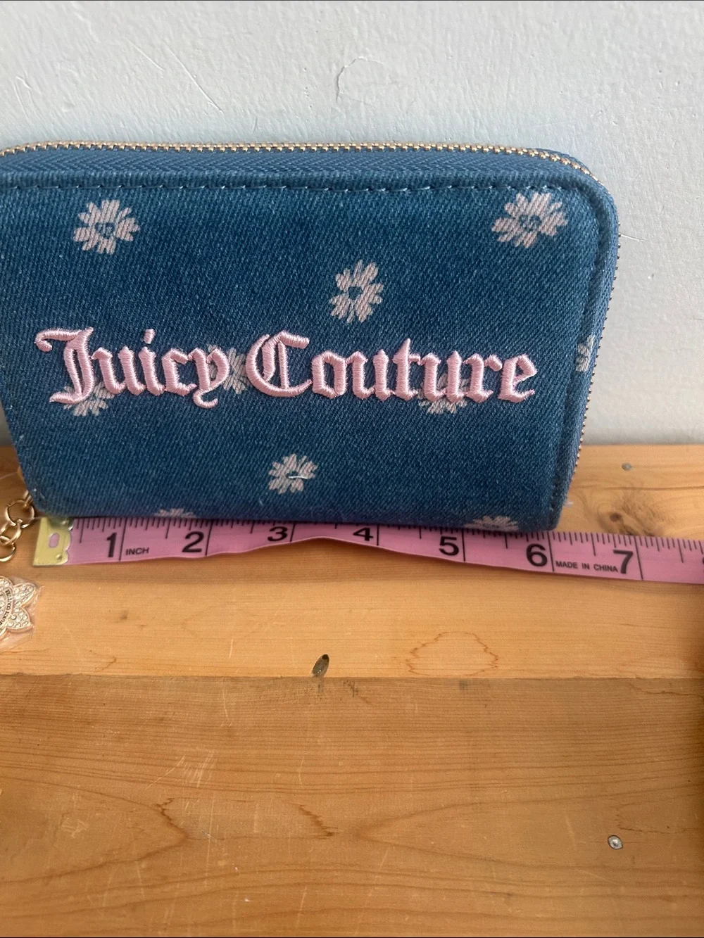 Juicy Couture denim daisy zip wallet with pink logo